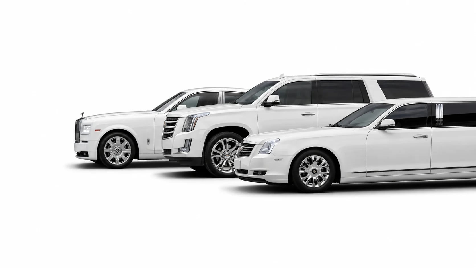 A lineup of three white Danaro luxury vehicles.
