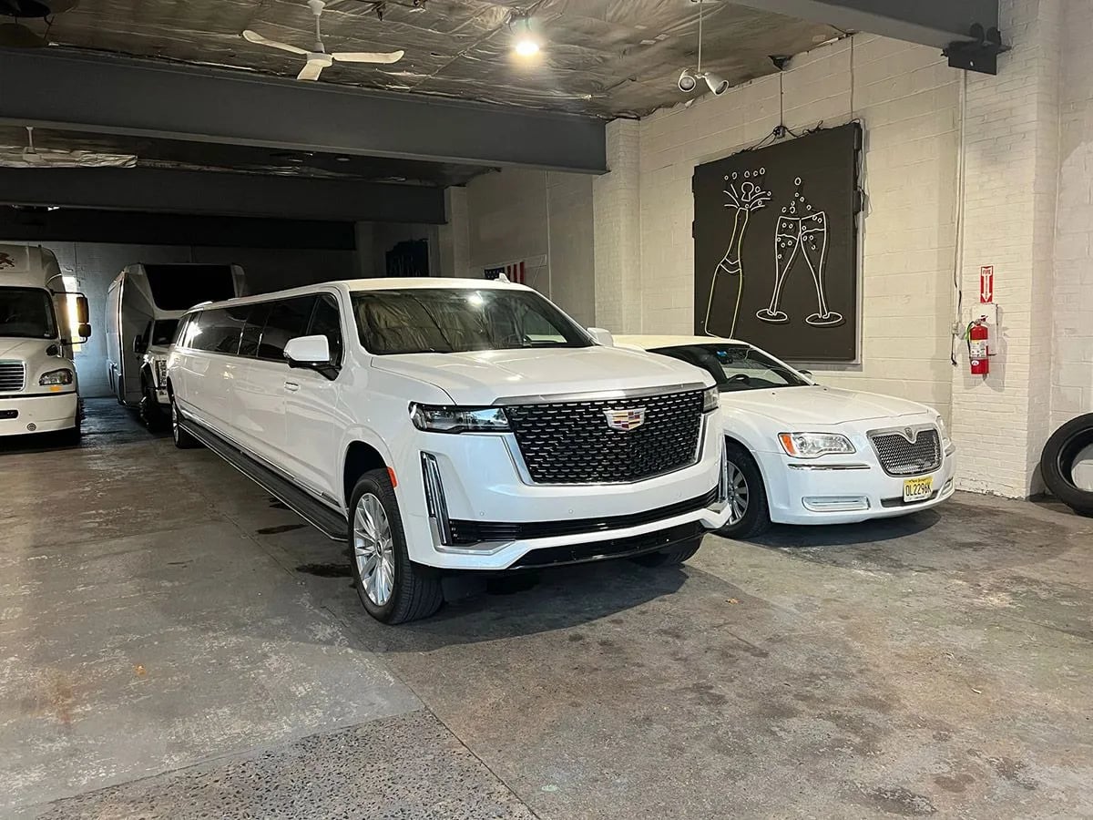 Danaro white Cadillac Escalade stretch limousine